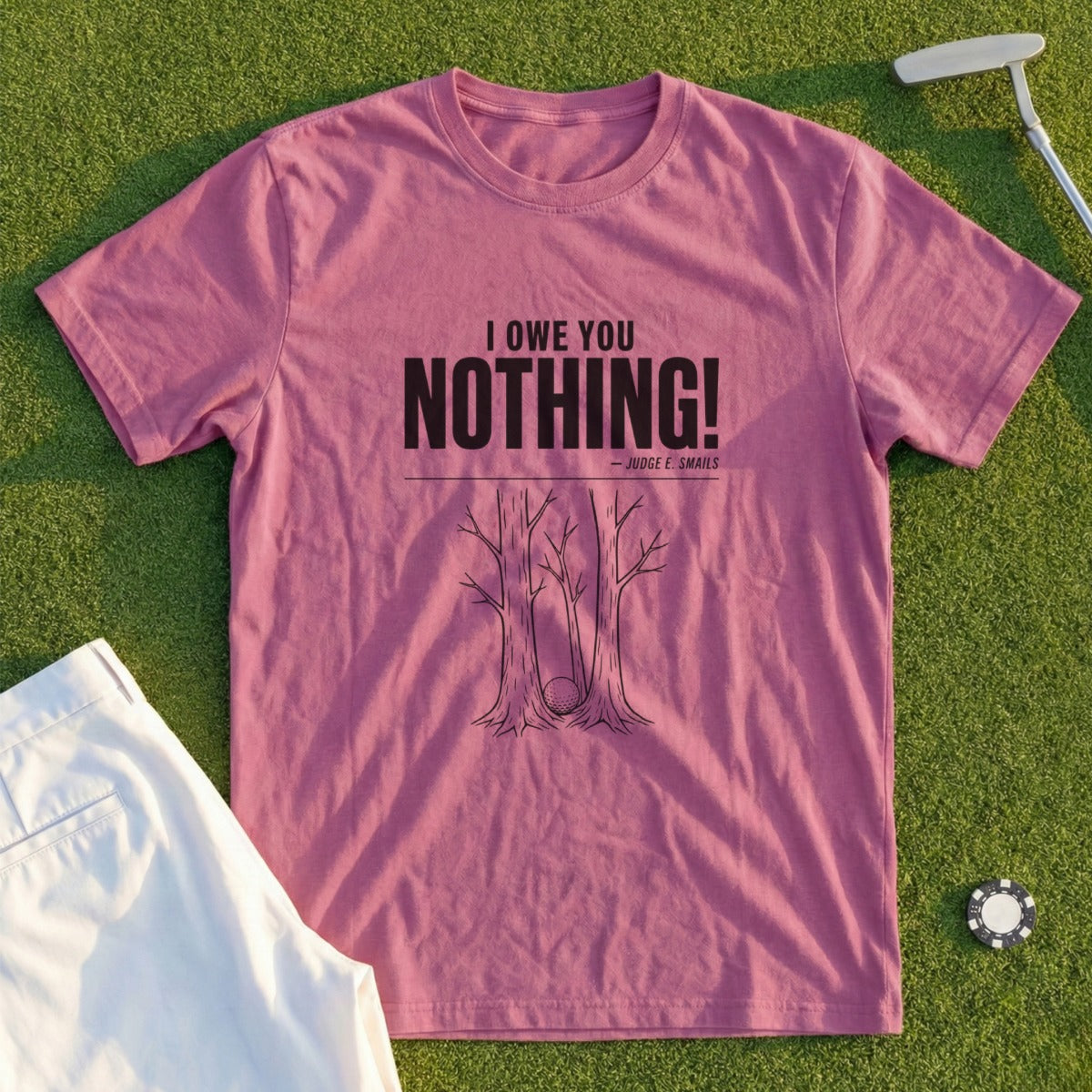 Rose t-shirt with "I owe you nothing!" text and a golf ball stuck in trees.