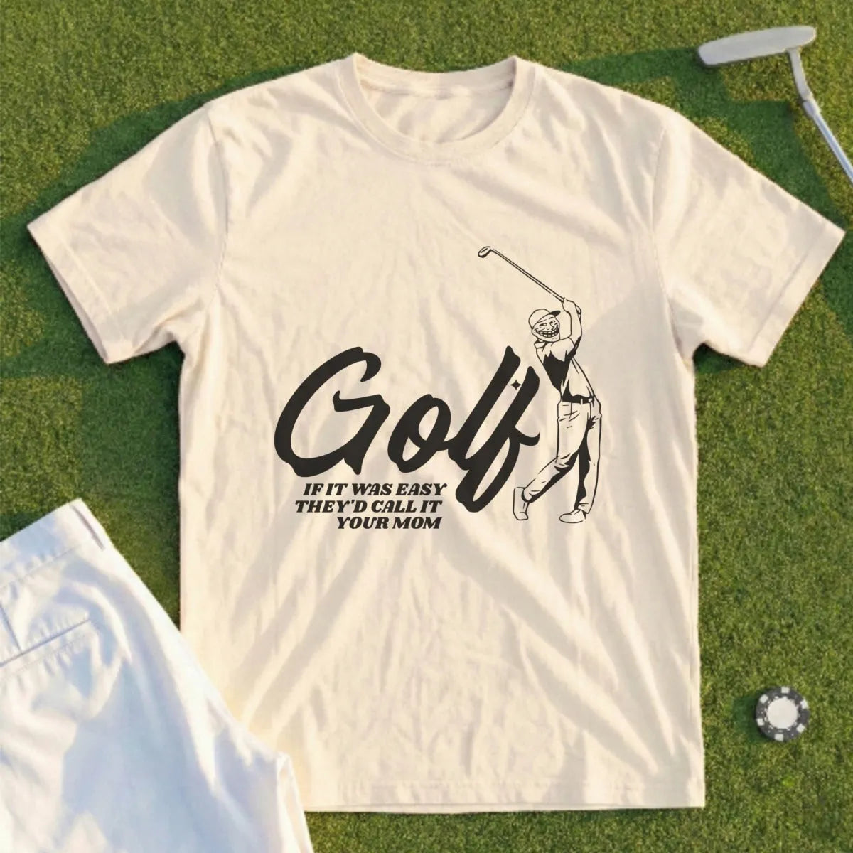 Cream t-shirt with golfer graphic and "Golf If It Was Easy They'd Call It Your Mom" text.