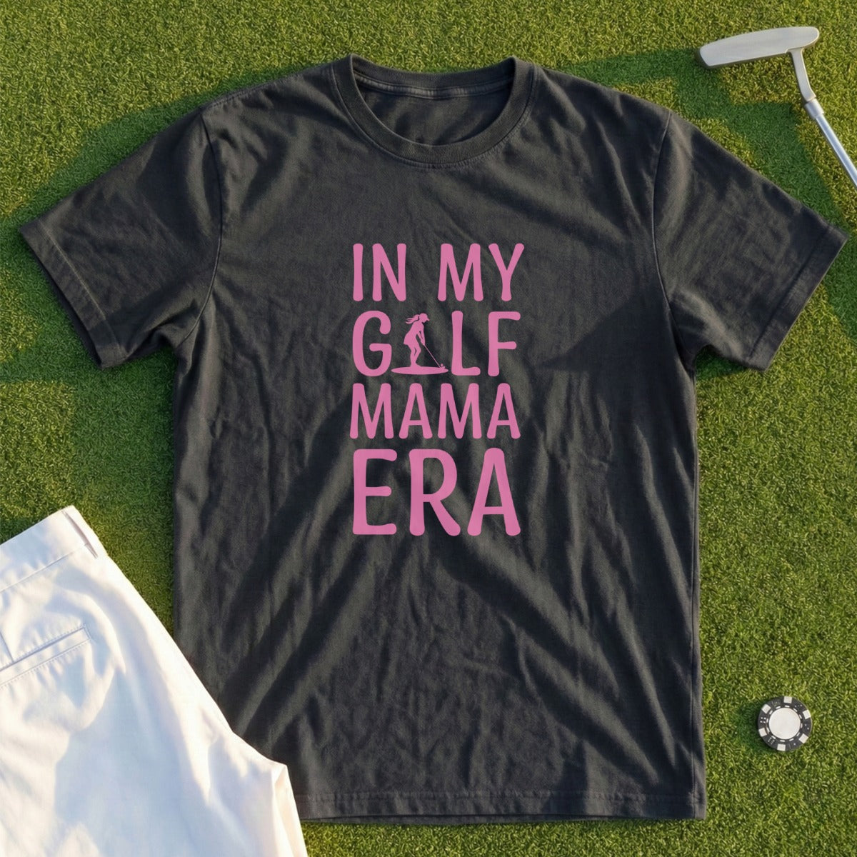 Dark t-shirt with "IN MY GOLF MAMA ERA" in pink text.
