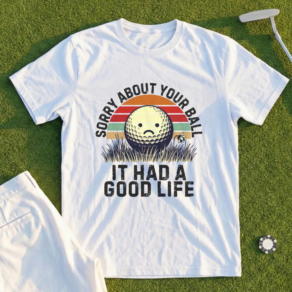 T-shirt with a golf ball graphic and text "Sorry About Your Ball It Had A Good Life."