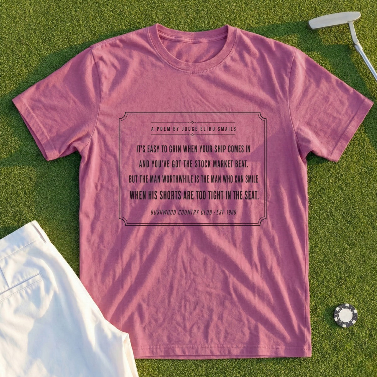 Pink t-shirt with a poem about smiling through adversity, from Bushwood Country Club.