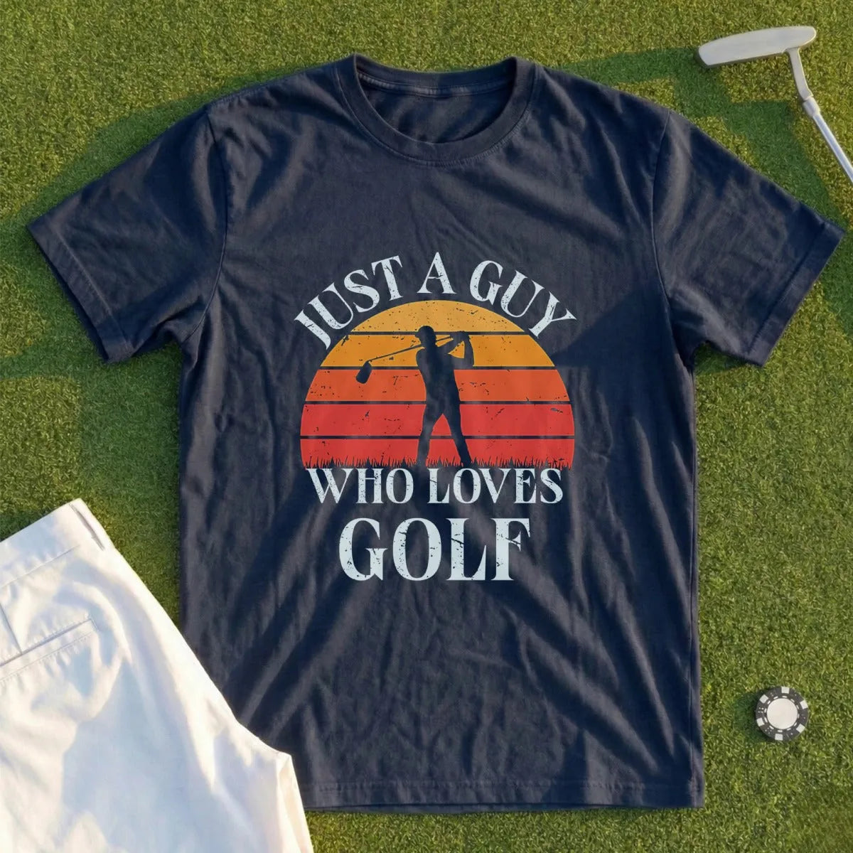 Dark blue t-shirt with "Just A Guy Who Loves Golf" and golfer graphic.