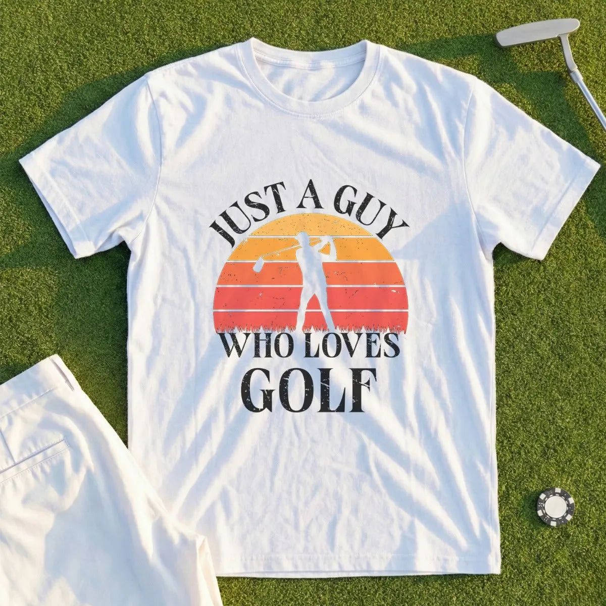 White t-shirt with "Just a guy who loves golf" text and golfer silhouette.