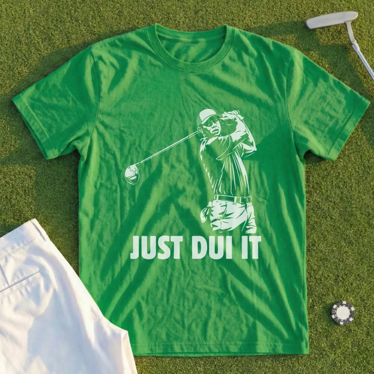 Green t-shirt with golfer swinging club and text "JUST DUI IT".