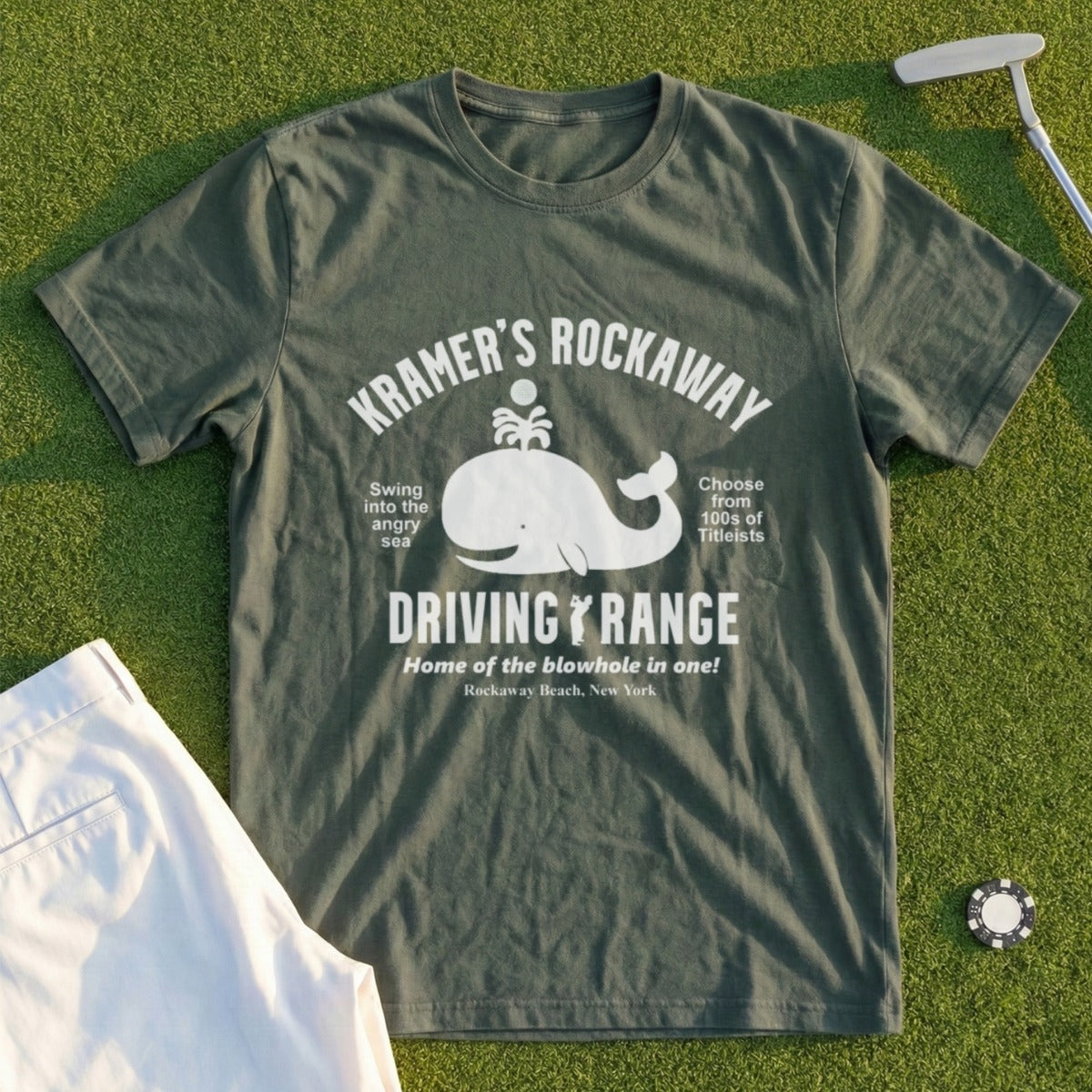 Green t-shirt with "KRAMER'S ROCKAWAY DRIVING RANGE" text and whale graphic.