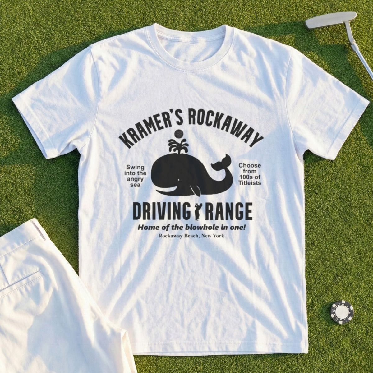 Kramer's Rockaway Driving Range white t-shirt with whale graphic.