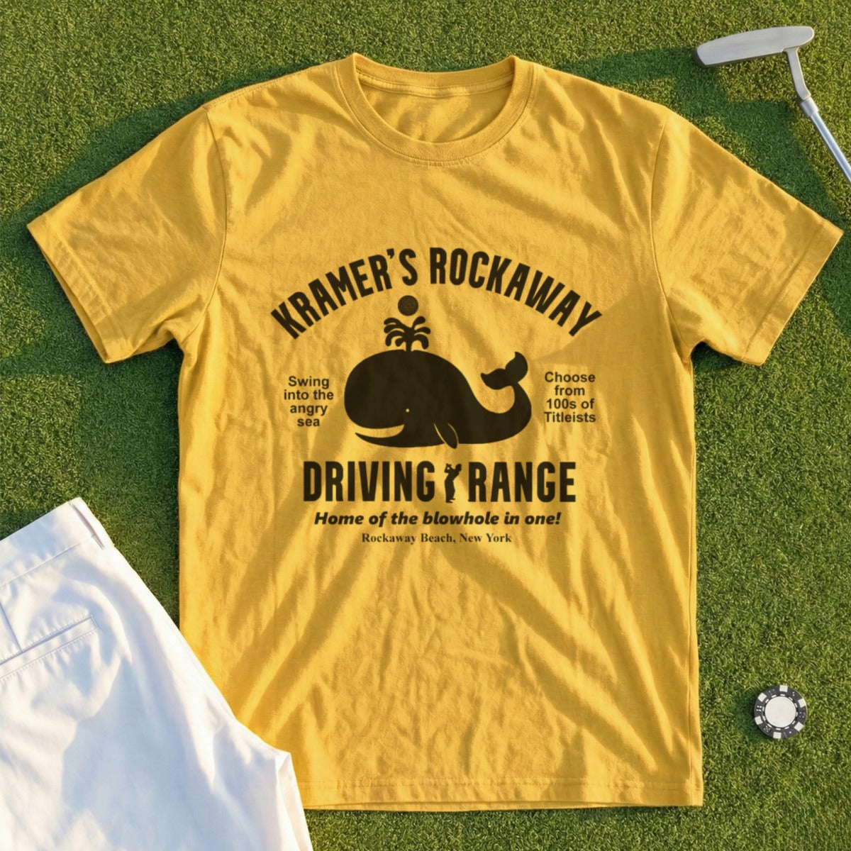 Yellow t-shirt with "Kramer's Rockaway Driving Range" whale logo and text.