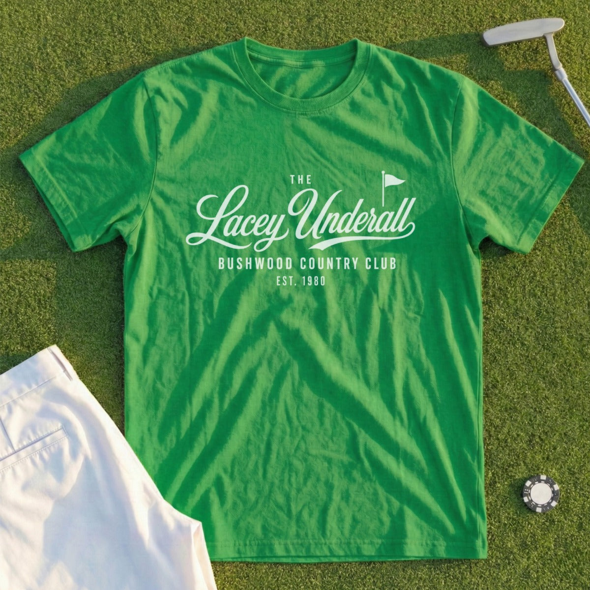 Green t-shirt with Lacey Underall Bushwood Country Club logo, est. 1980.