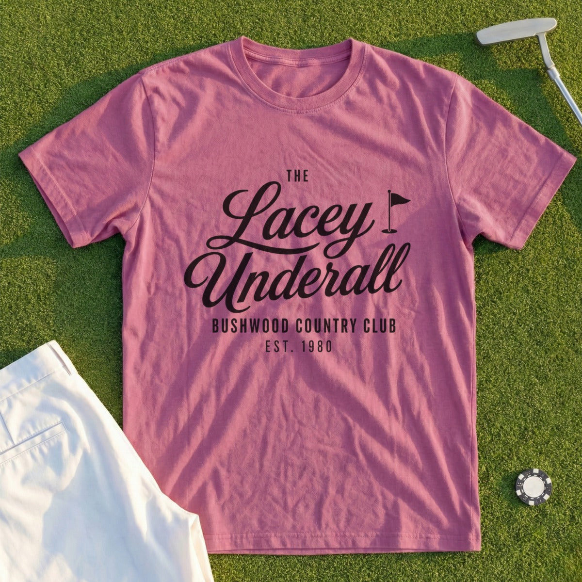 Pink t-shirt with "The Lacey Underall Bushwood Country Club Est. 1980" text.