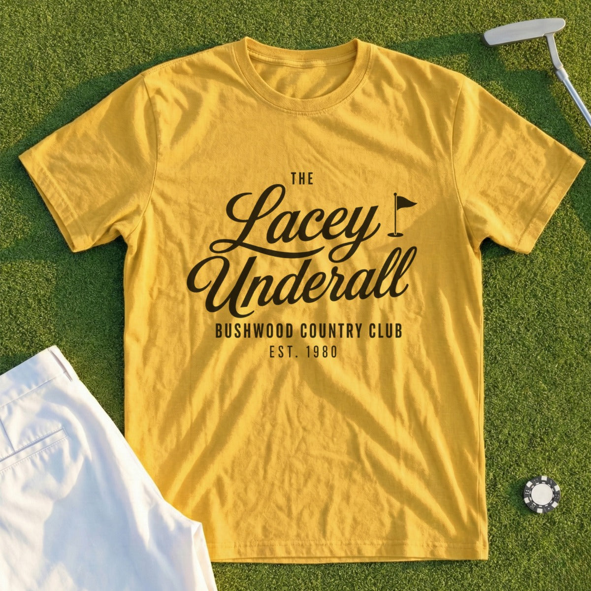 Yellow t-shirt with "Lacey Underall, Bushwood Country Club est. 1980" text.
