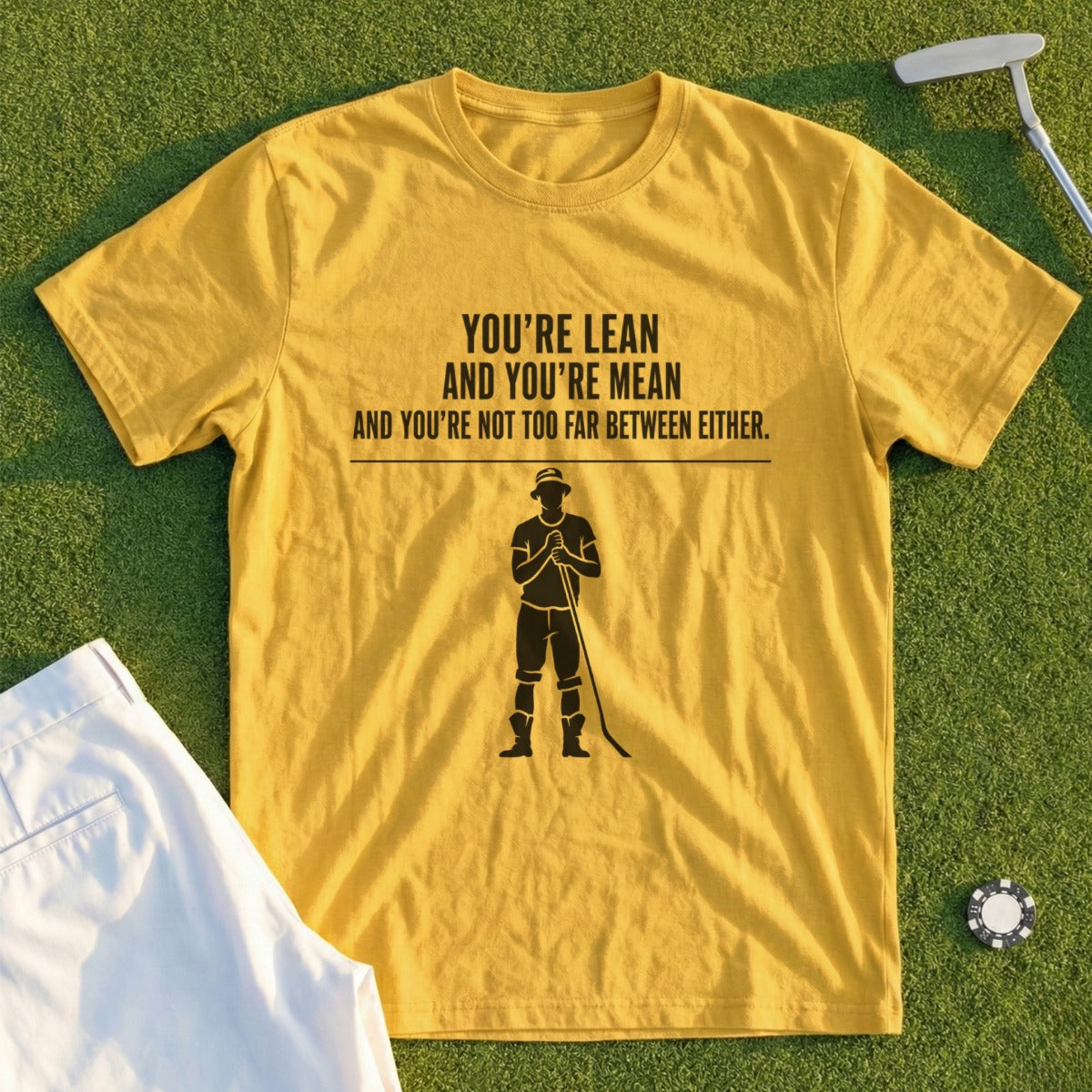 Yellow t-shirt with text "YOU'RE LEAN AND YOU'RE MEAN AND YOU'RE NOT TOO FAR BETWEEN EITHER."