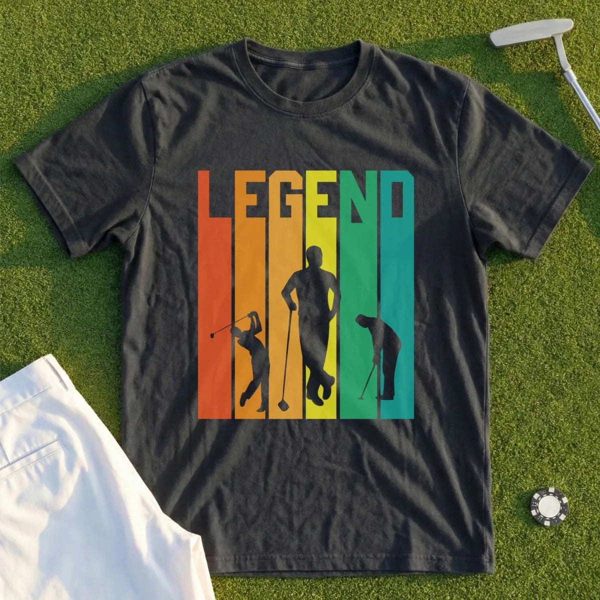 Dark t-shirt with "LEGEND" text and golfer silhouettes on striped background.