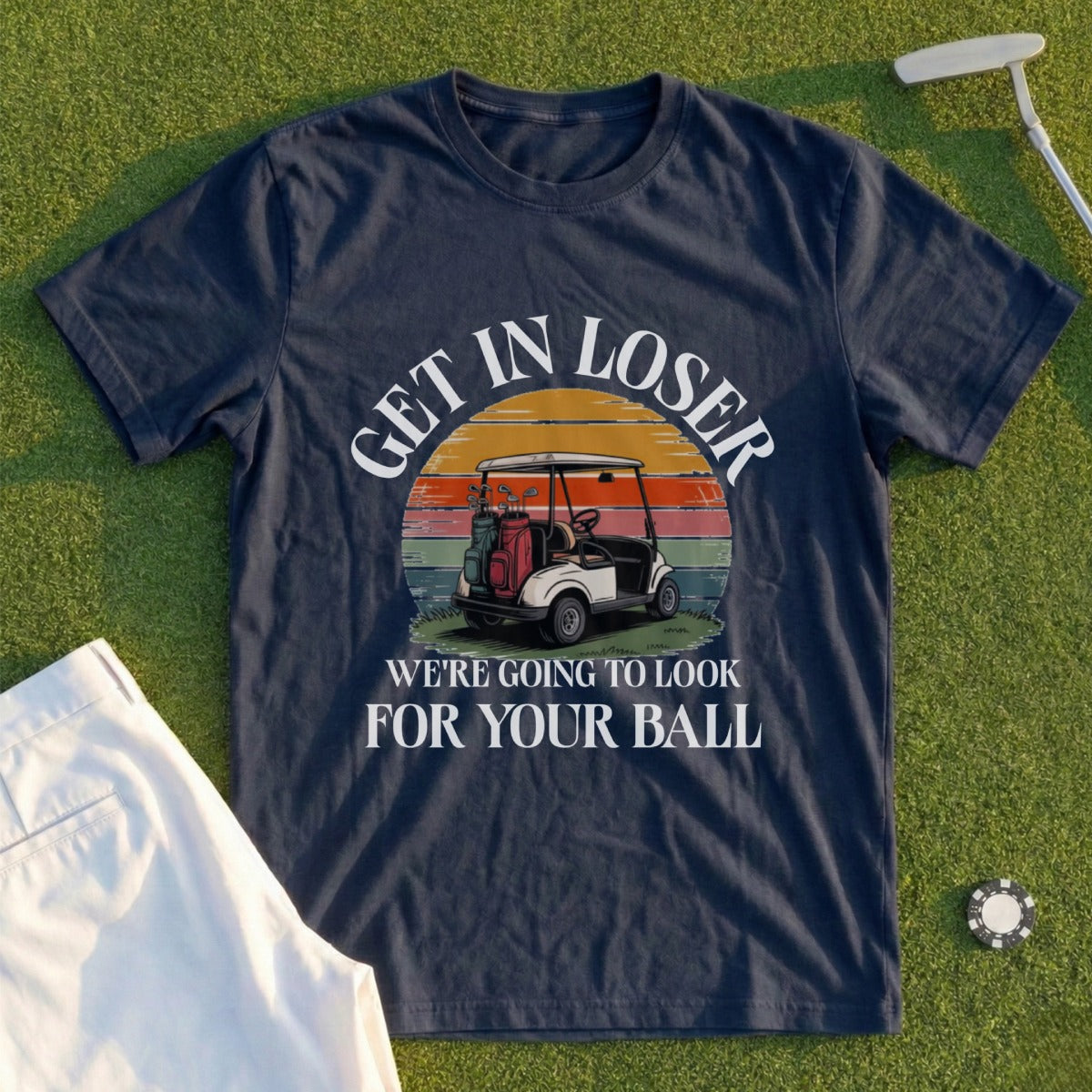 Navy t-shirt with graphic of golf cart and text "Get in loser, we're going to look for your ball."