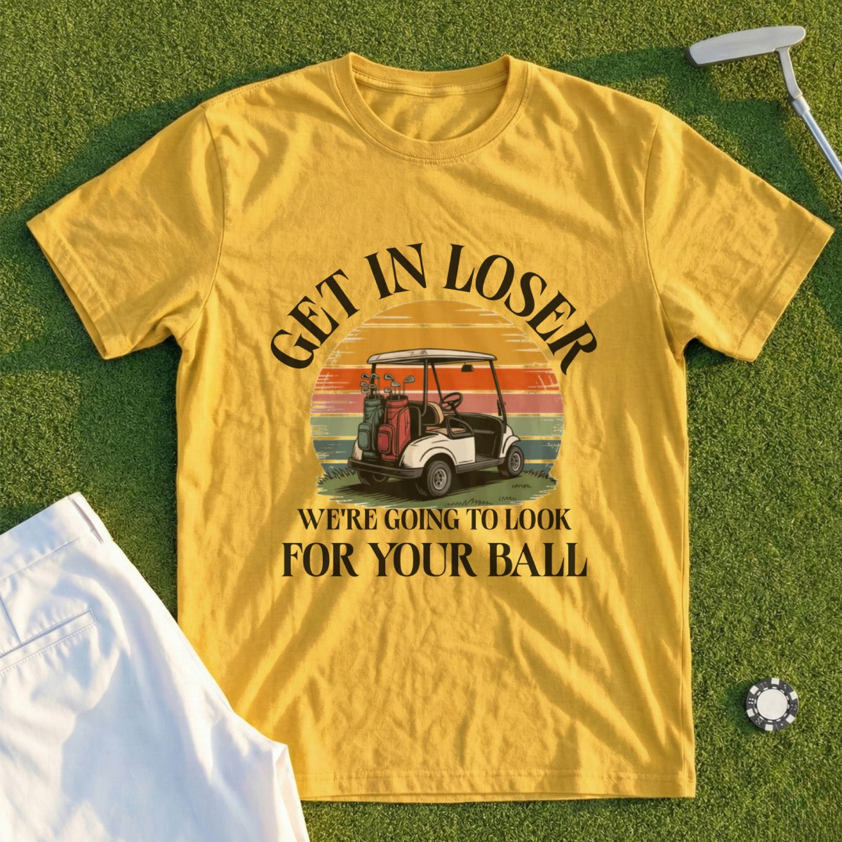 Yellow t-shirt with golf scene and text "Get In Loser We're Going To Look For Your Ball".