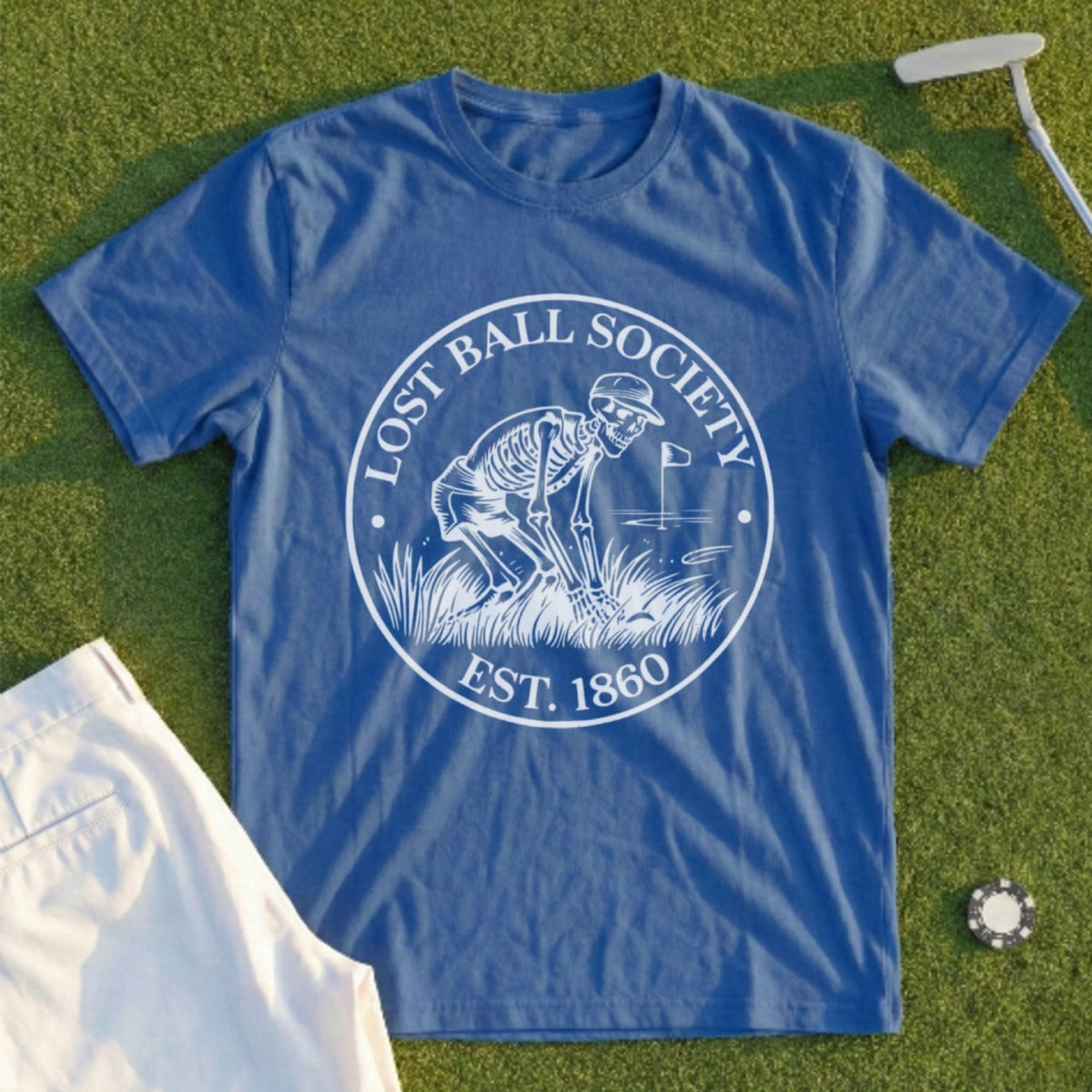 Blue t-shirt with "Lost Ball Society Est. 1860" logo featuring a skeleton golfing.