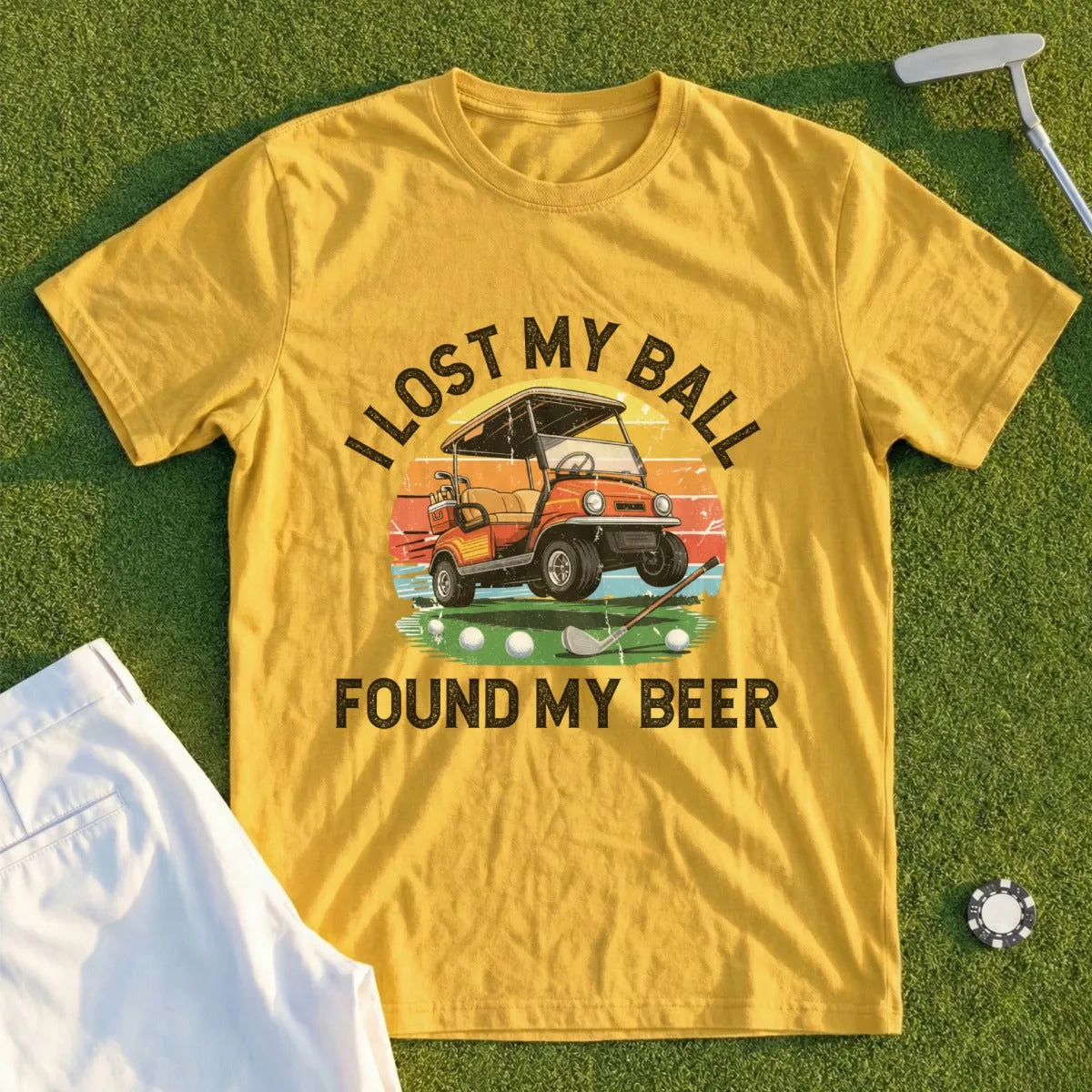 Yellow t-shirt with text "I lost my ball found my beer" and a golf cart graphic.