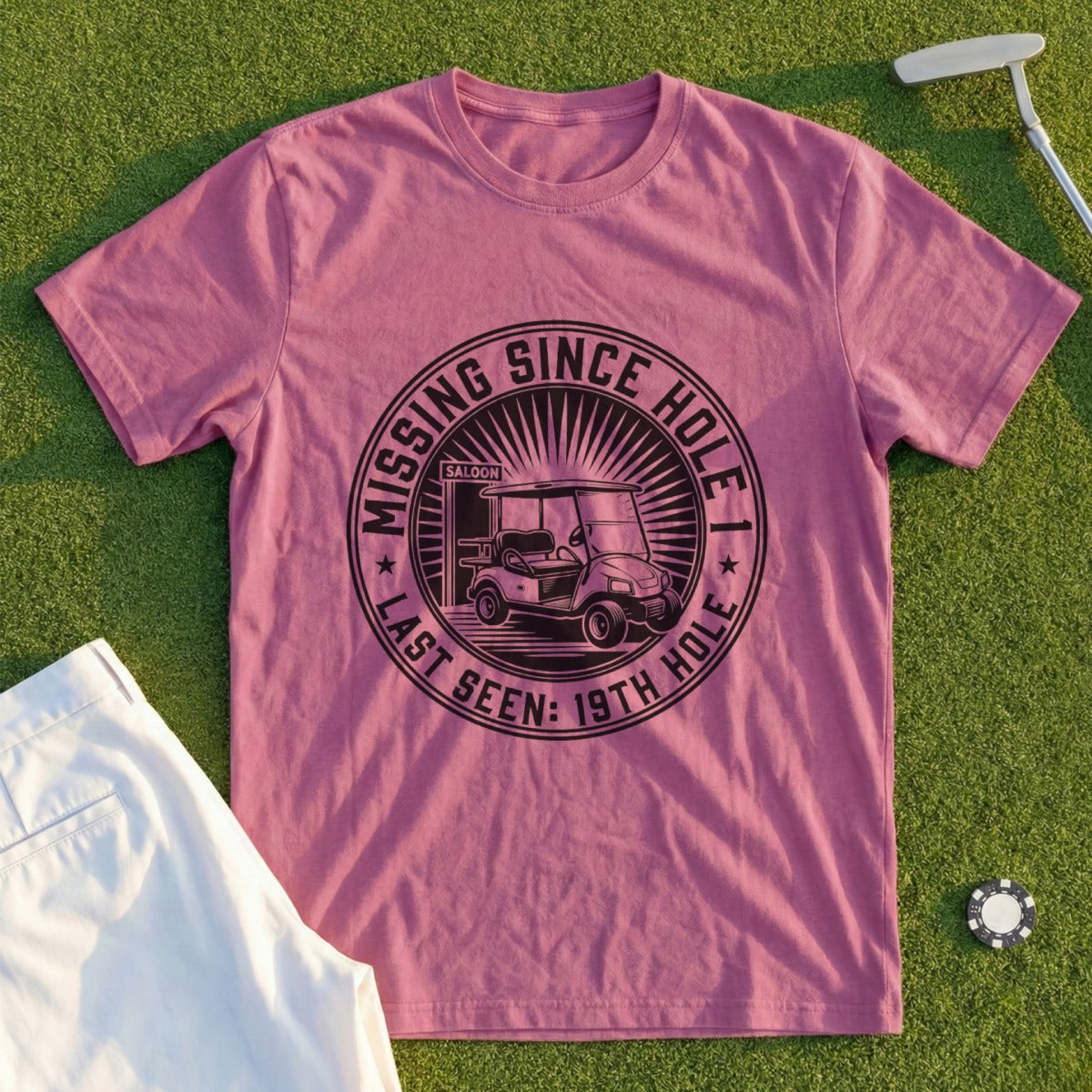 Pink t-shirt with "MISSING SINCE LAST SEEN: 19TH HOLE" and golf cart graphic.