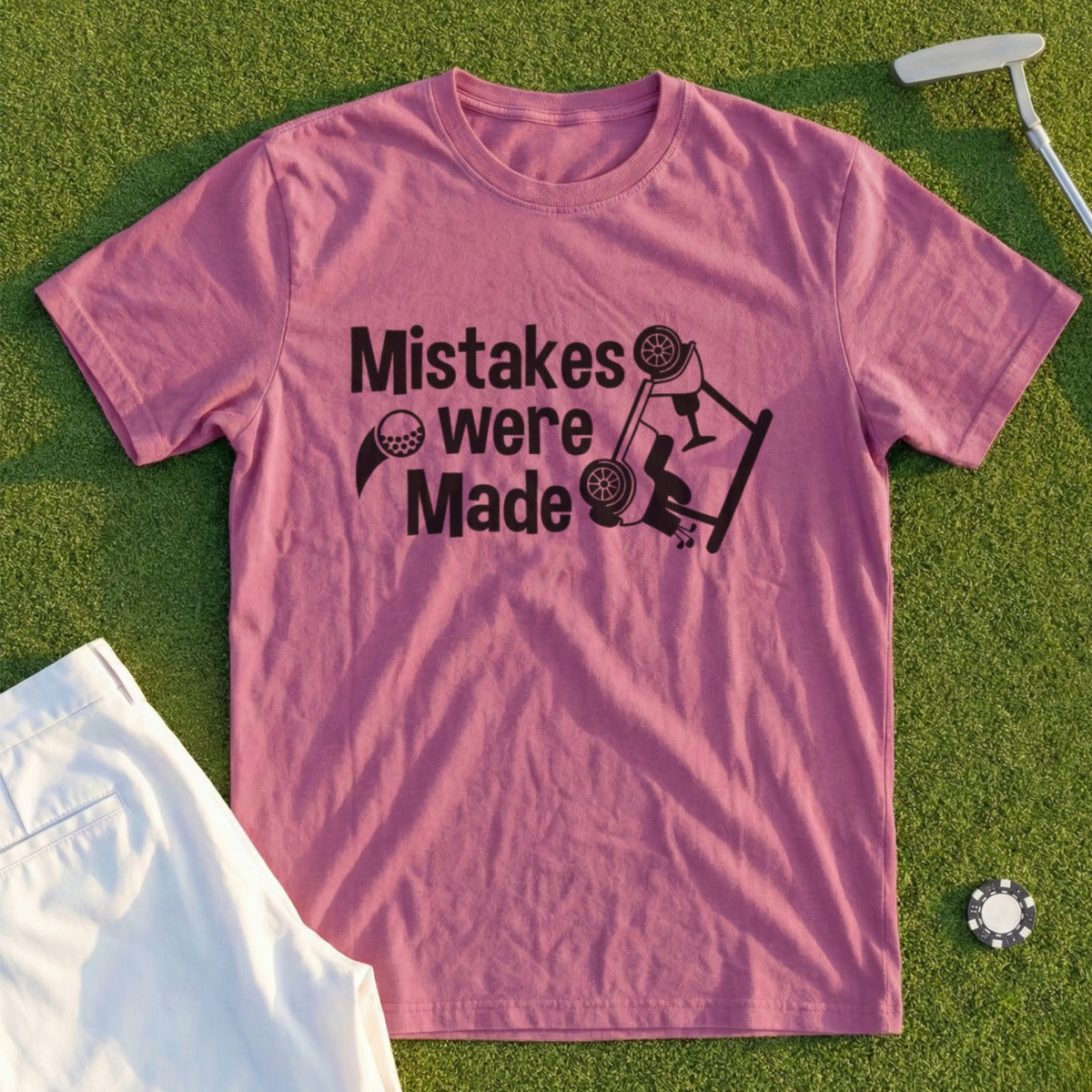 Pink t-shirt with "Mistakes were Made" text and a car crash graphic.