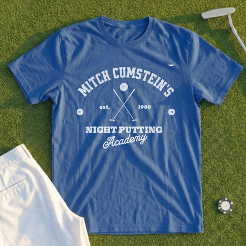 Blue t-shirt with "Mitch Cumstein's Night Putting Academy" text and golf accessories.