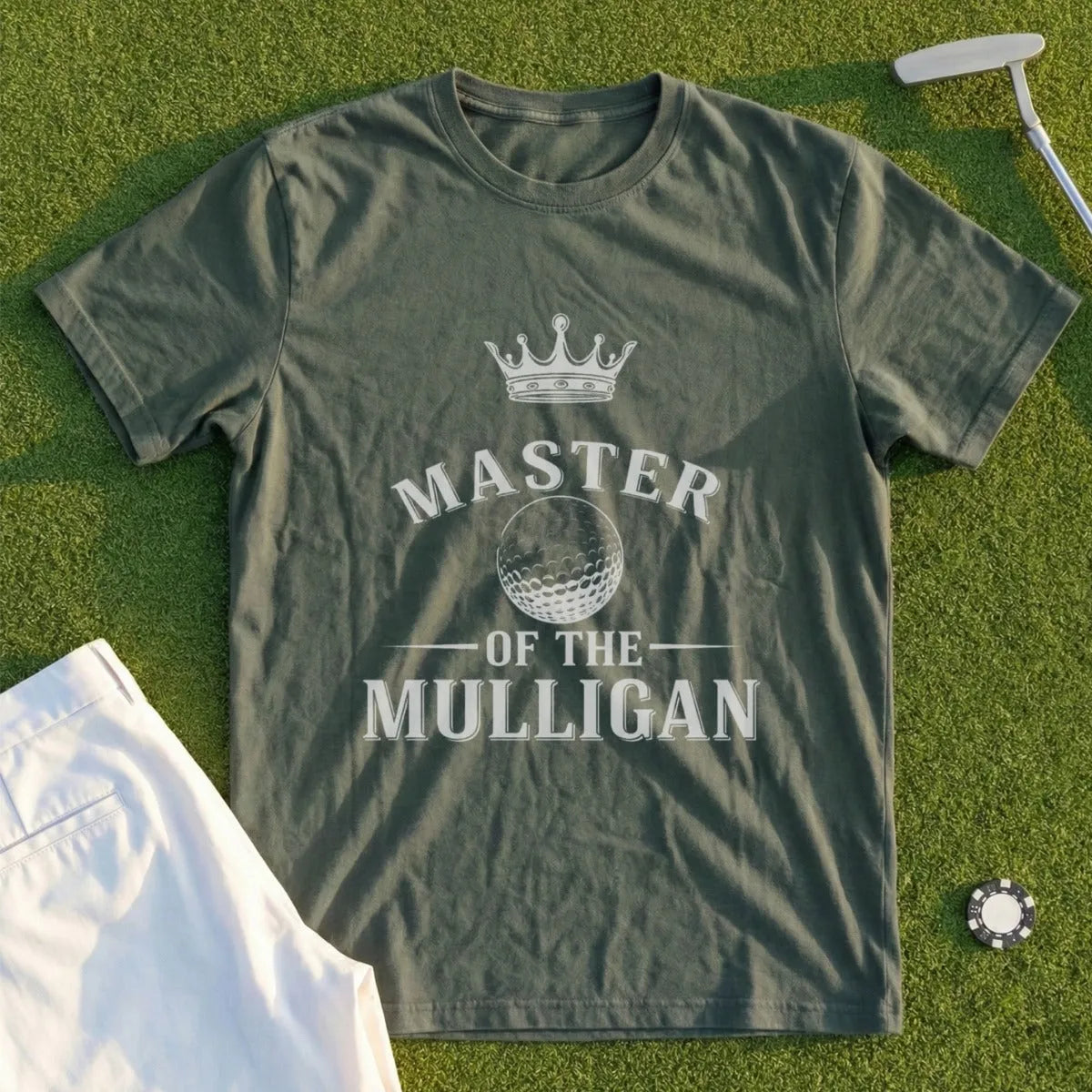 Green t-shirt with "MASTER OF THE MULLIGAN" and golf ball graphic.