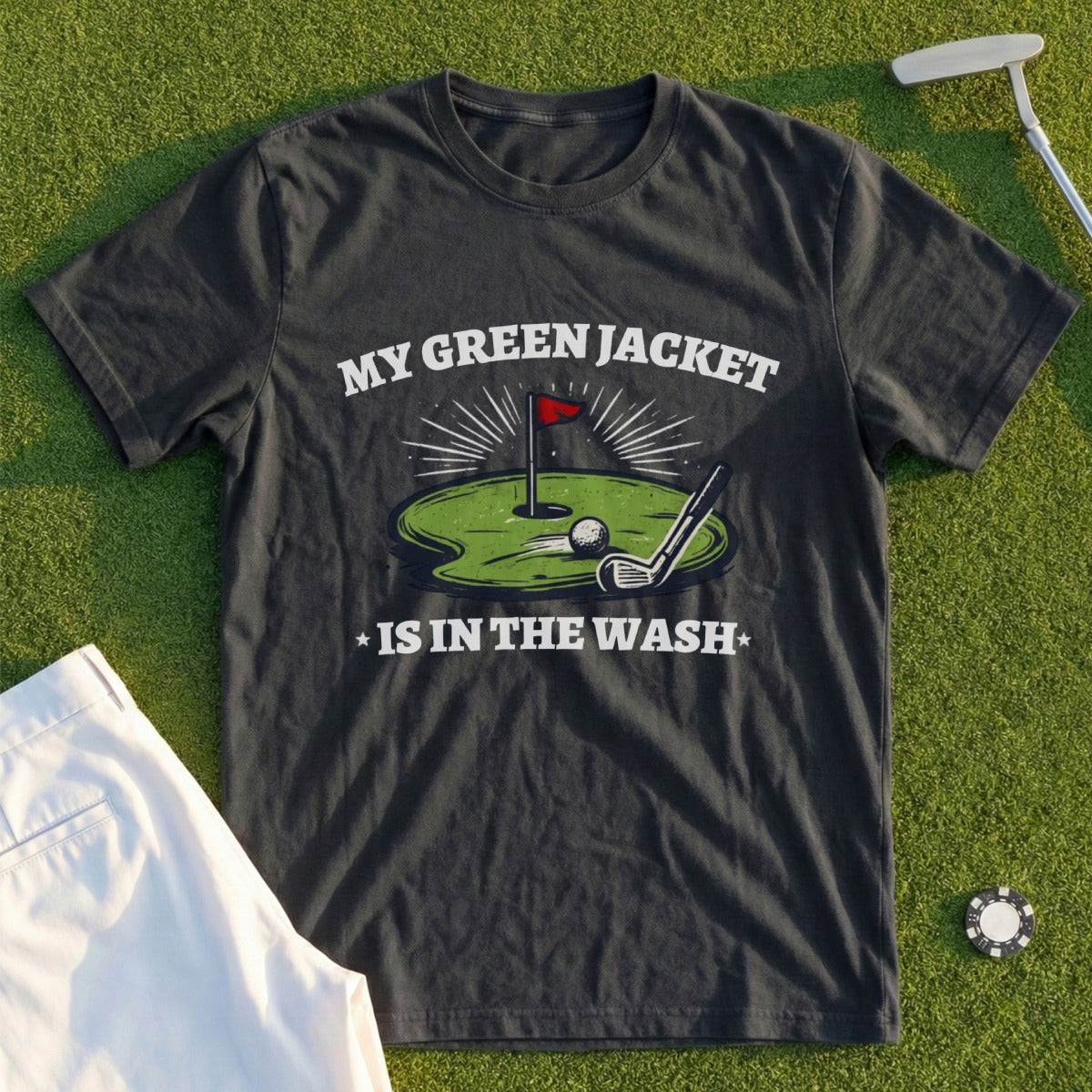 Dark t-shirt with "MY GREEN JACKET IS IN THE WASH" and golf graphic.