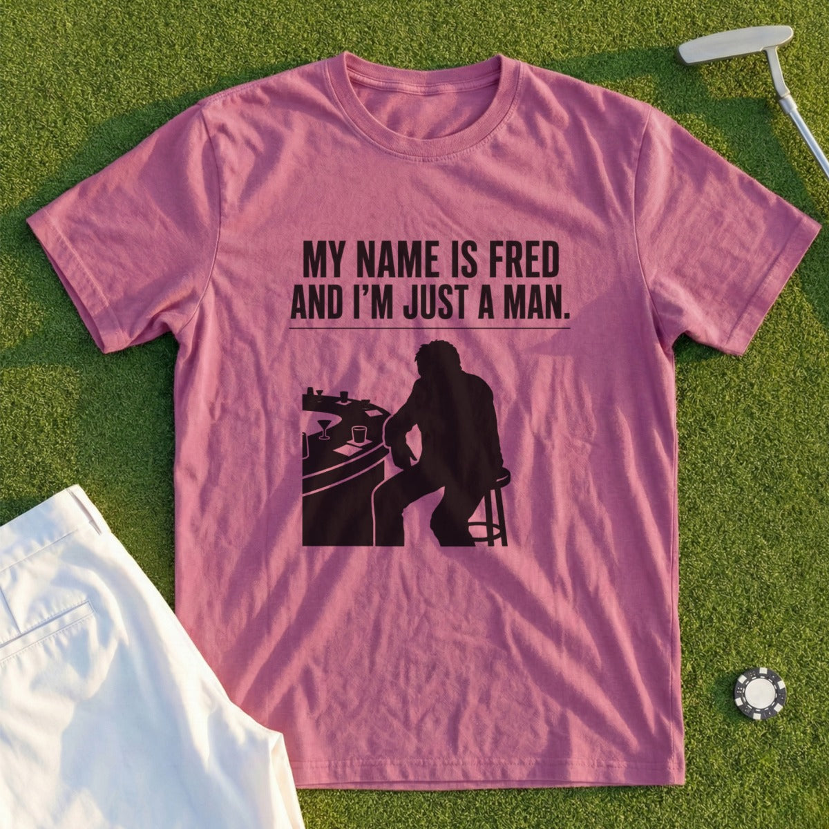 T-shirt with "MY NAME IS FRED AND I'M JUST A MAN." text and silhouette.