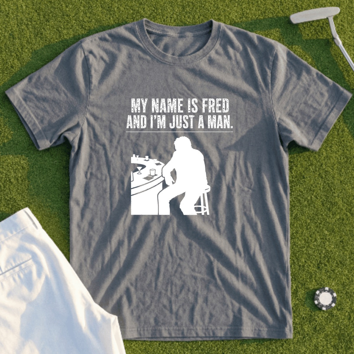 Gray t-shirt with white text "MY NAME IS FRED AND I'M JUST A MAN."