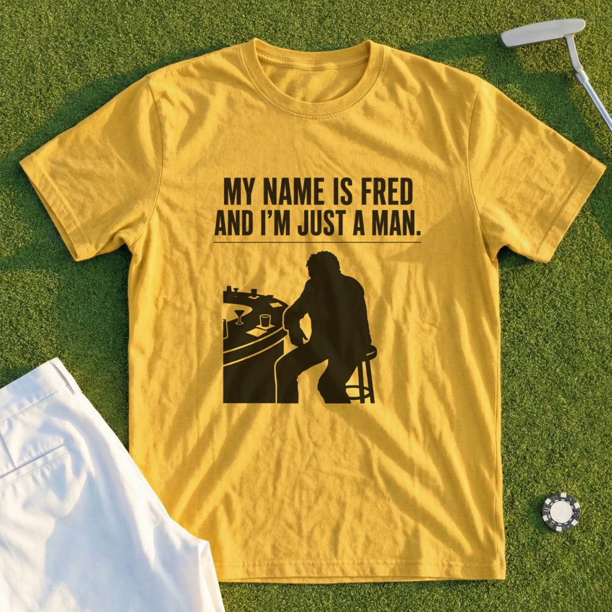 Yellow t-shirt with "My Name Is Fred and I'm Just a Man" and a silhouette.