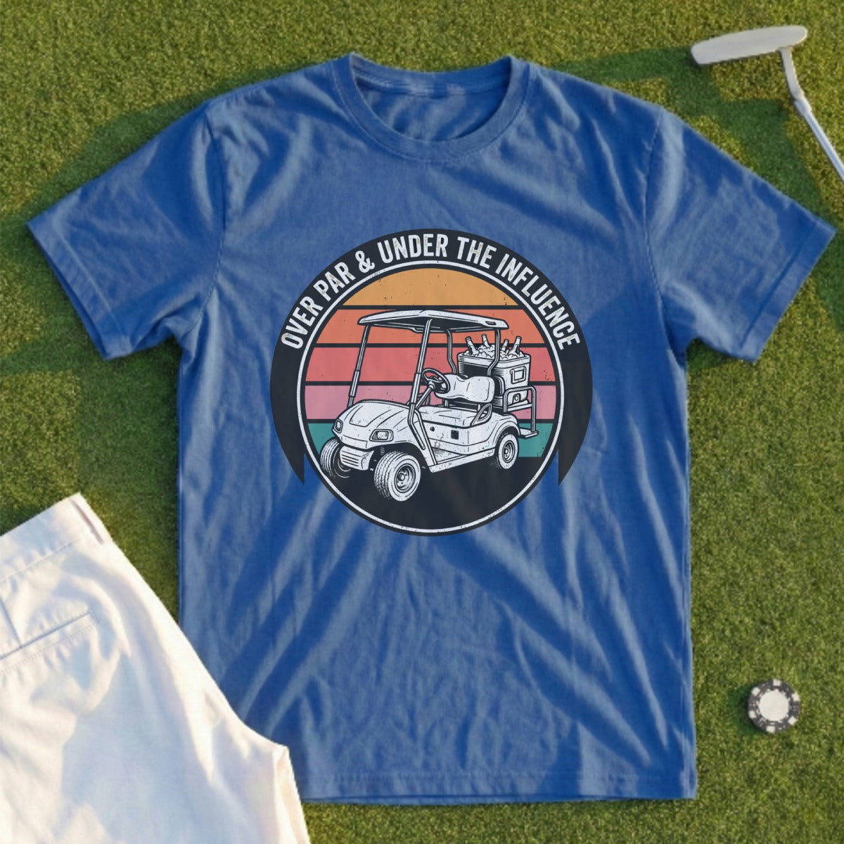 Blue t-shirt with a graphic of a golf cart and the text "OVER PAR & UNDER THE INFLUENCE".