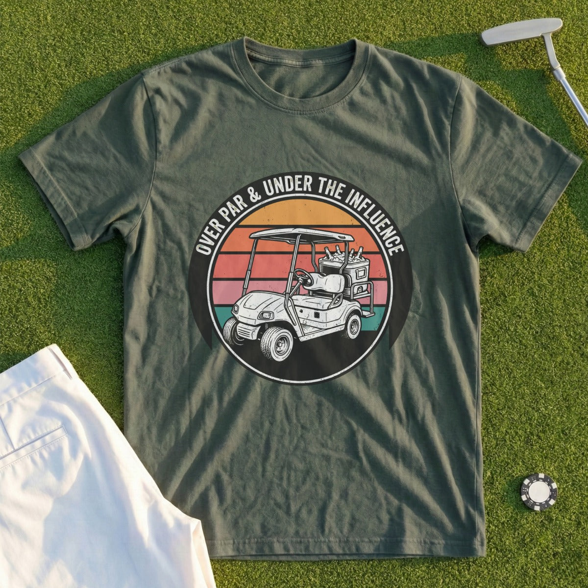 Olive green t-shirt with graphic of golf cart and text "OVER PAR & UNDER THE INFLUENCE".