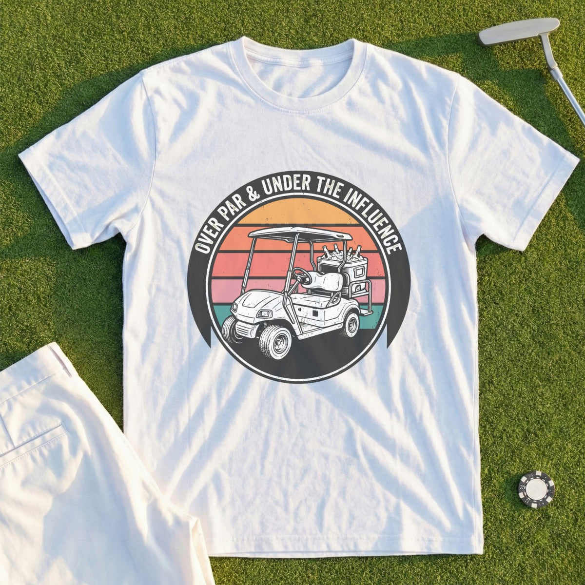 White t-shirt with graphic of golf cart and text "Over Par & Under The Influence".