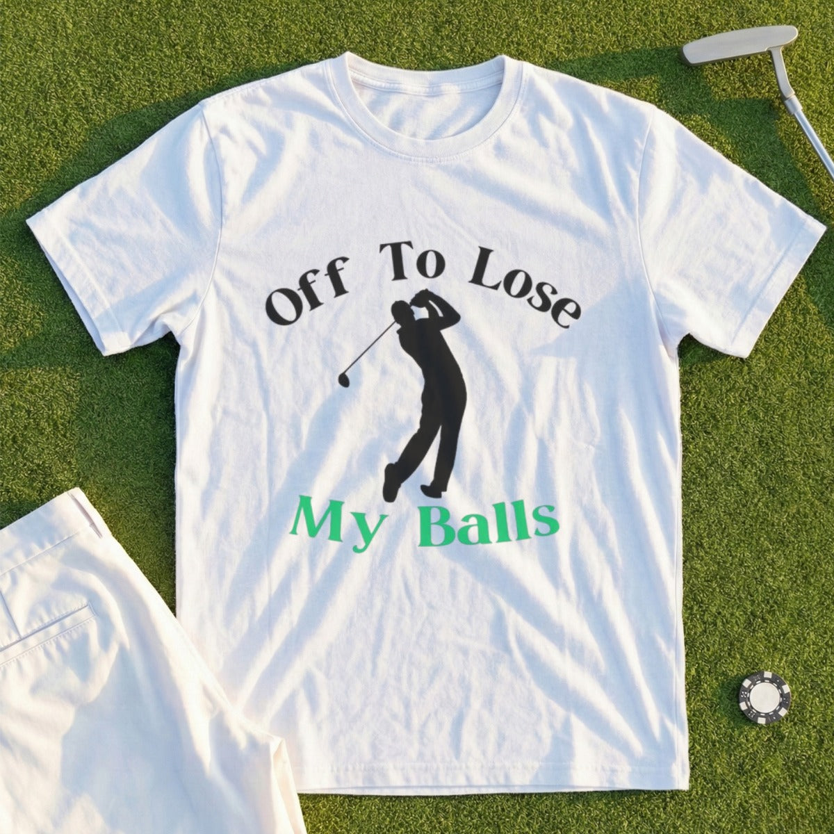 White t-shirt with "Off To Lose My Balls" text and golfer graphic.