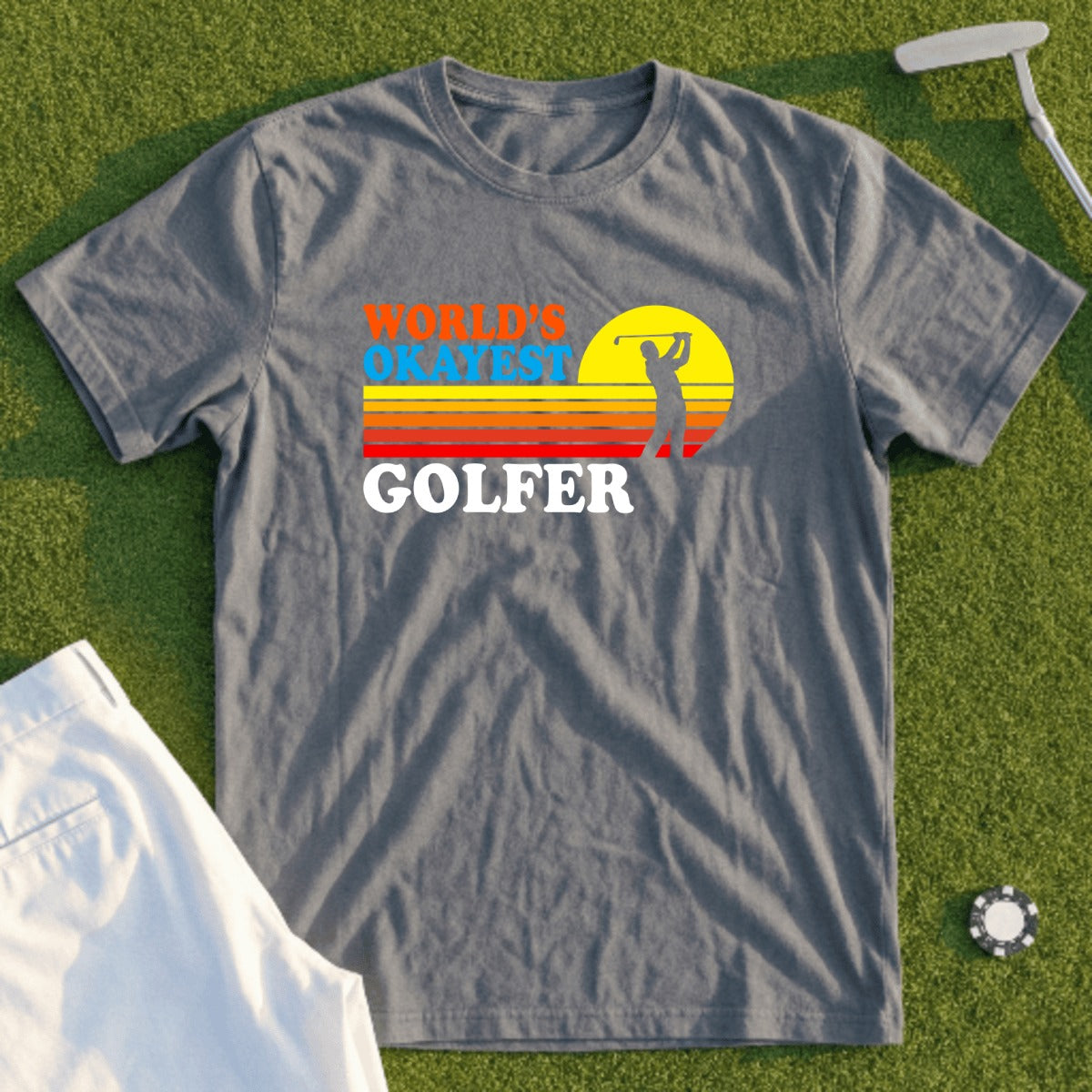 Grey t-shirt with "World's Okayest Golfer" text and a golfer silhouette.