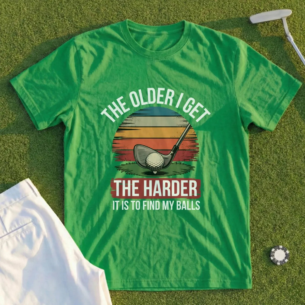 Green t-shirt with "The older I get the harder it is to find my balls" and golf imagery.