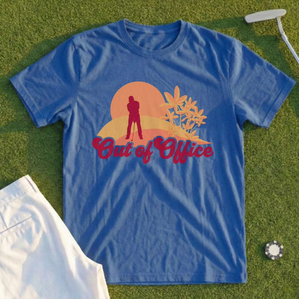 Blue t-shirt with "Out of Office" text and golfer silhouette at sunset.
