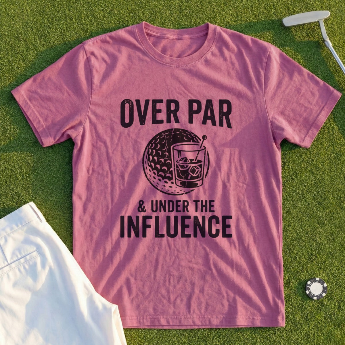 Maroon t-shirt with "OVER PAR & UNDER THE INFLUENCE" text and golf ball/drink graphic.