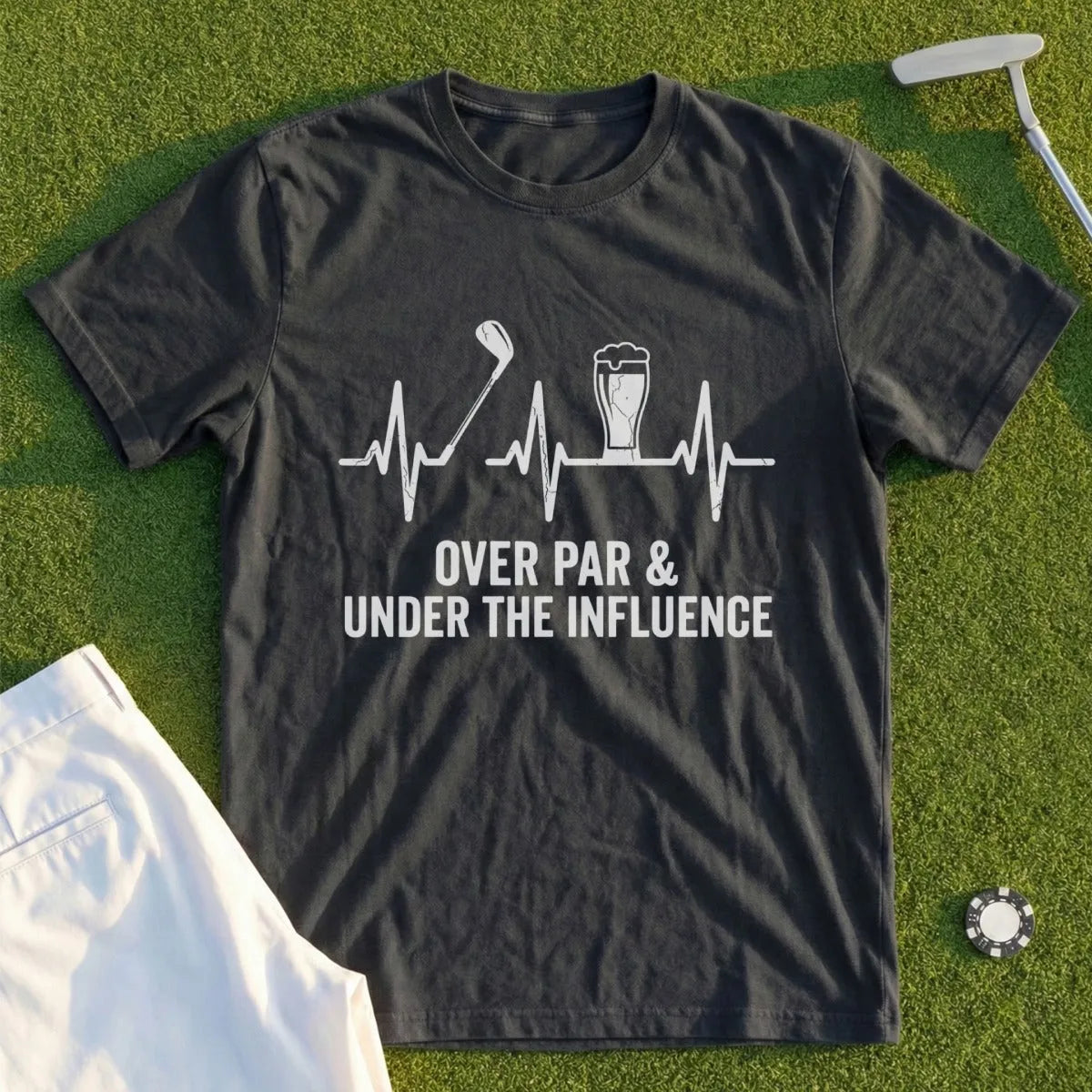 Dark t-shirt with golf club, beer, and heartbeat graphic and text.