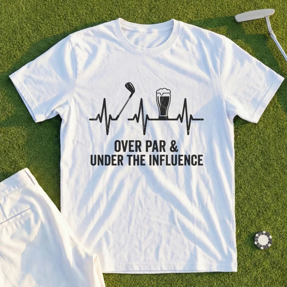 White t-shirt with golf club, beer, and heartbeat graphic, text: "Over par & Under the Influence"