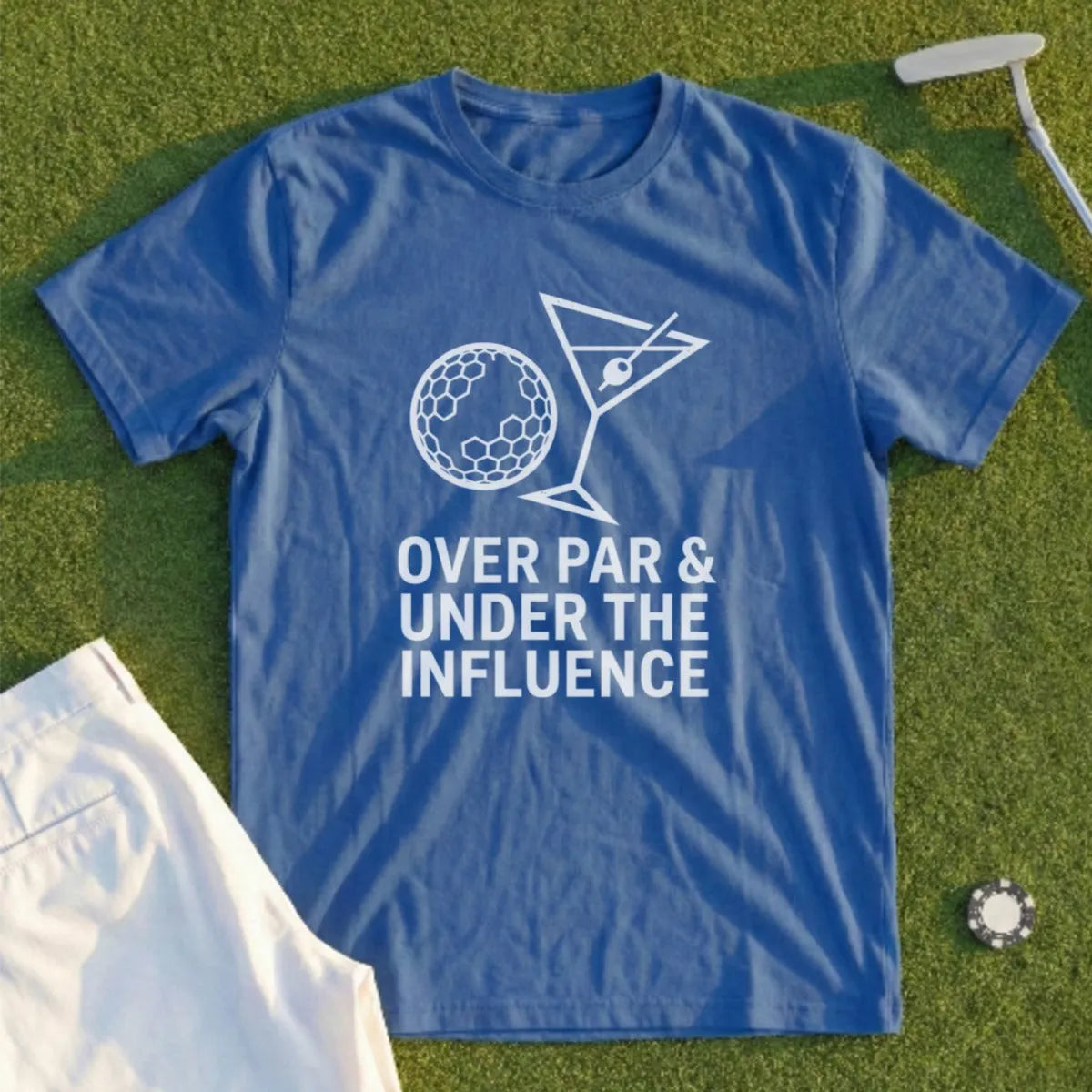 Blue t-shirt with graphic of golf ball and martini glass, reads "Over Par & Under The Influence".