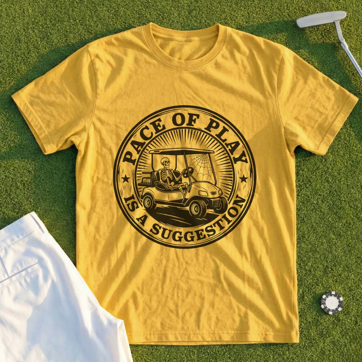 Yellow t-shirt with "Pace of Play is a Suggestion" text and skeleton golfing graphic.