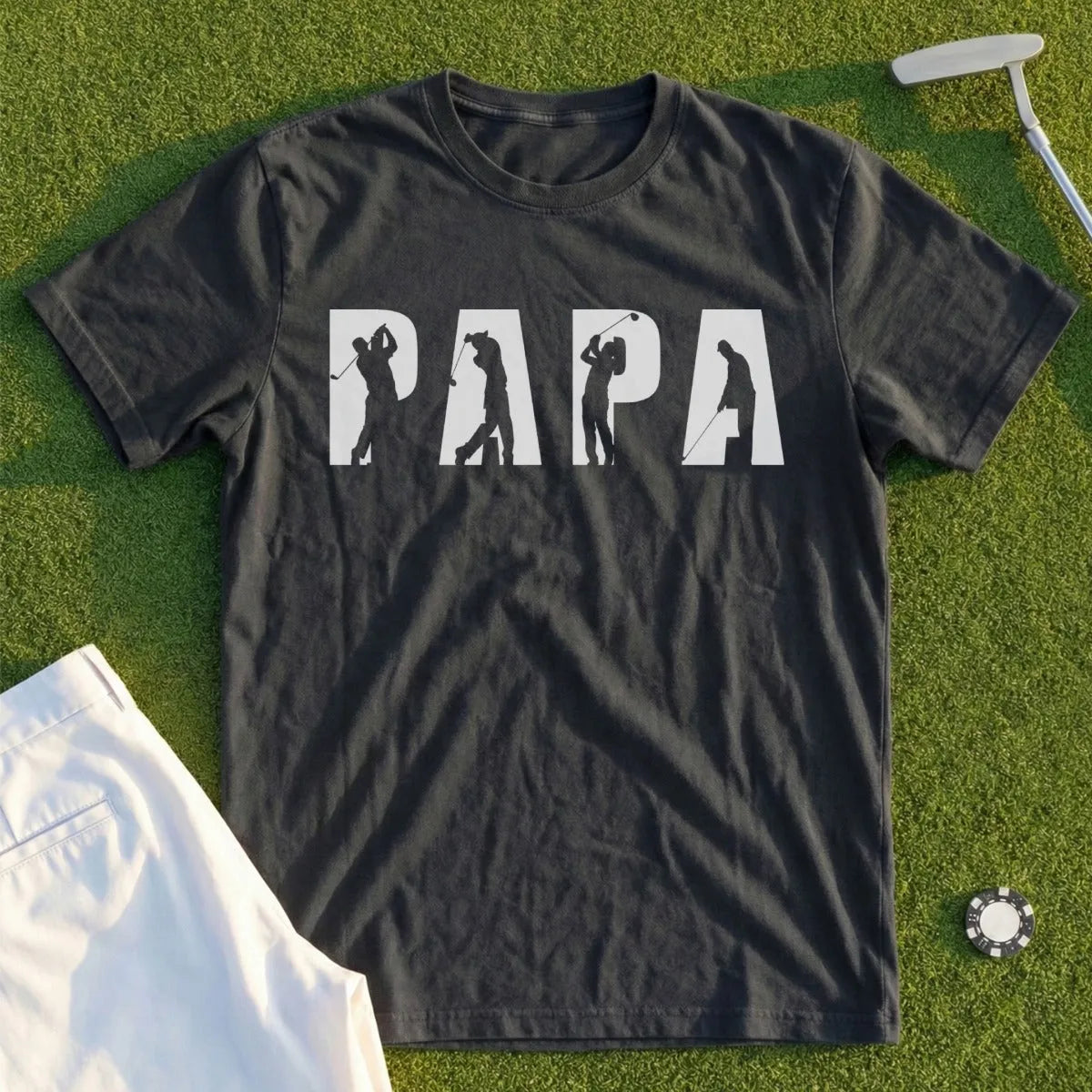 Dark t-shirt with "PAPA" text and silhouette golfers on a grassy background.