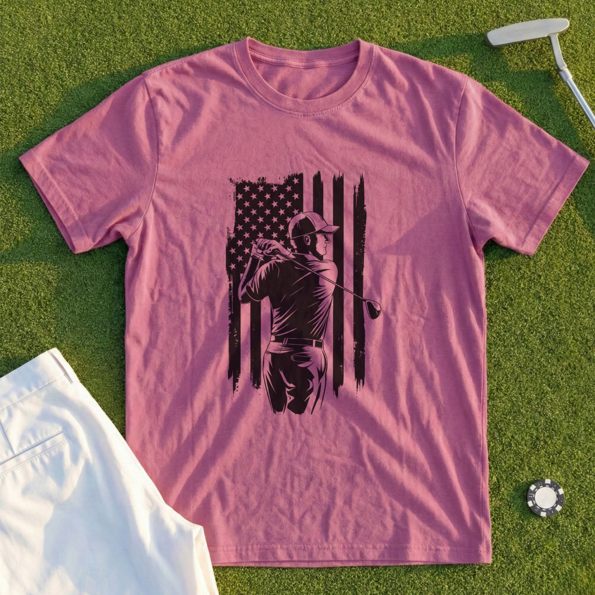 T-shirt with golfer swinging club against American flag background.