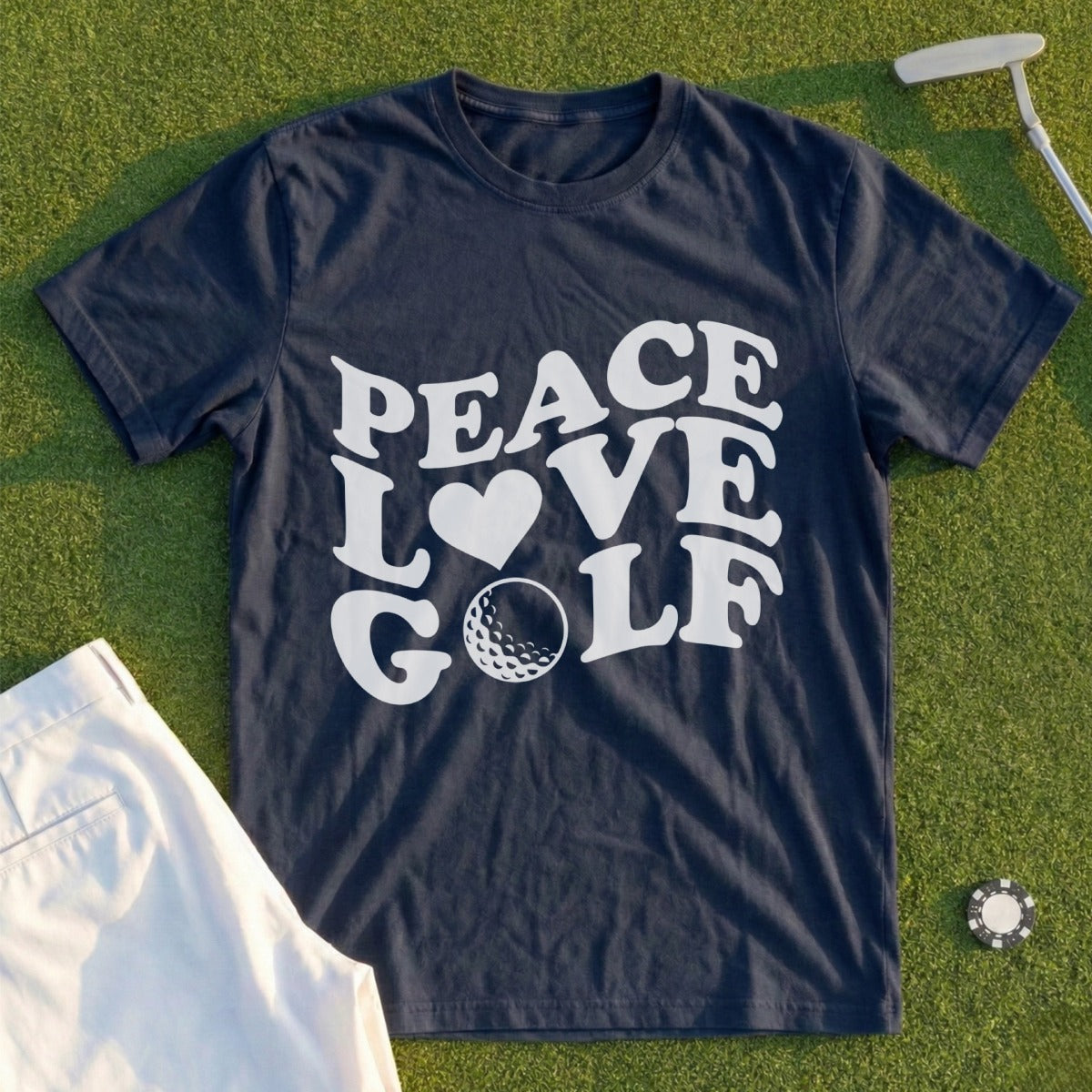 Navy t-shirt with "Peace Love Golf" text and a golf ball on grass.