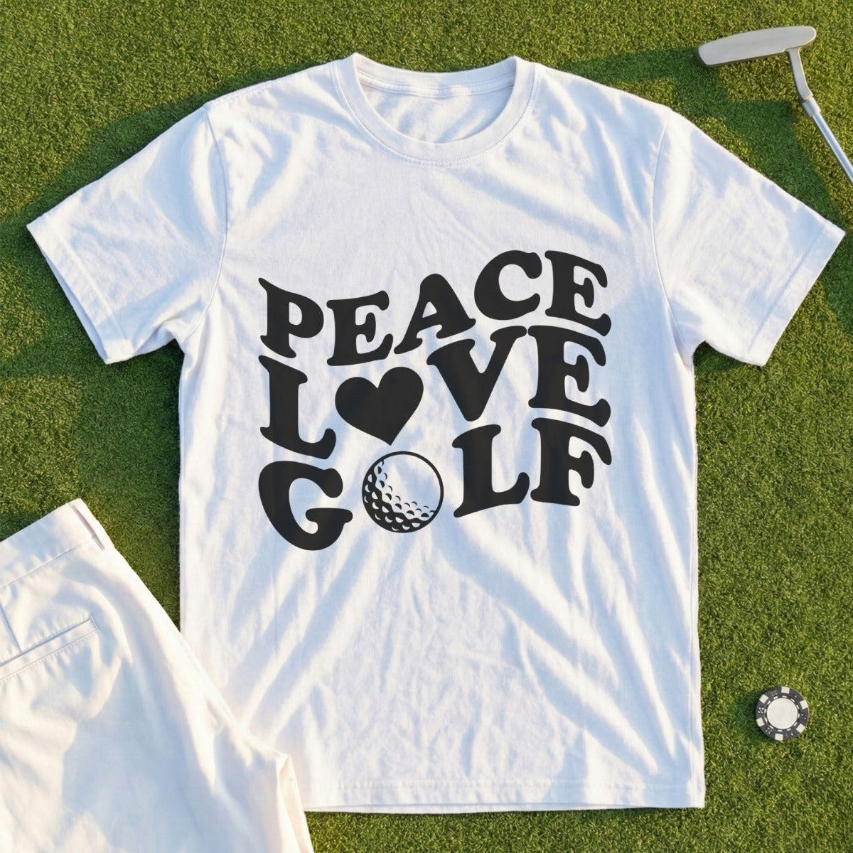 White t-shirt with "PEACE LOVE GOLF" text and a golf ball.