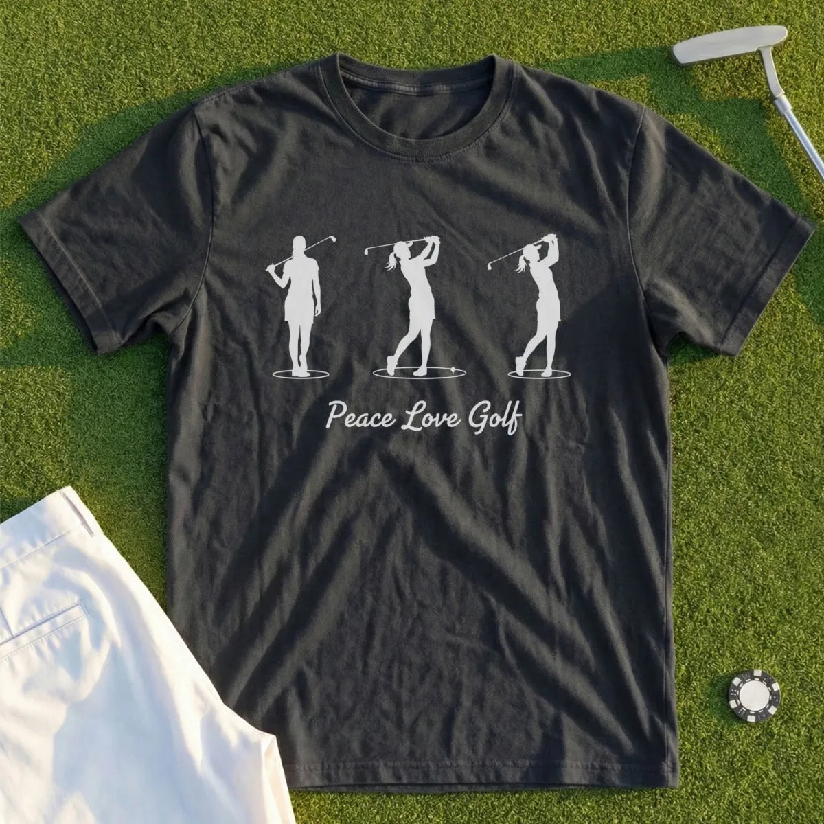 Dark t-shirt with white golfer silhouettes and "Peace Love Golf" text.