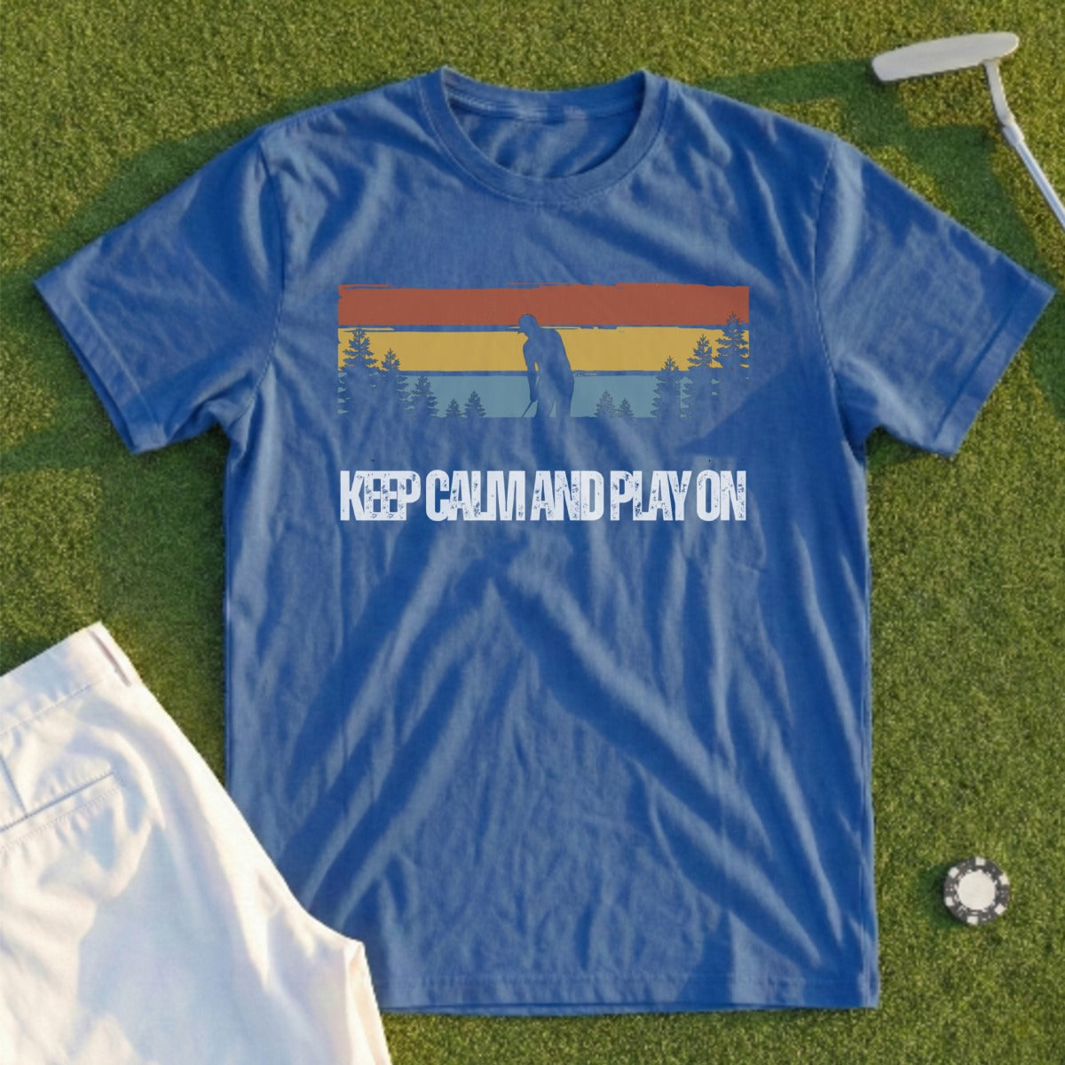 Blue t-shirt with "KEEP CALM AND PLAY ON" and golfer silhouette graphic.