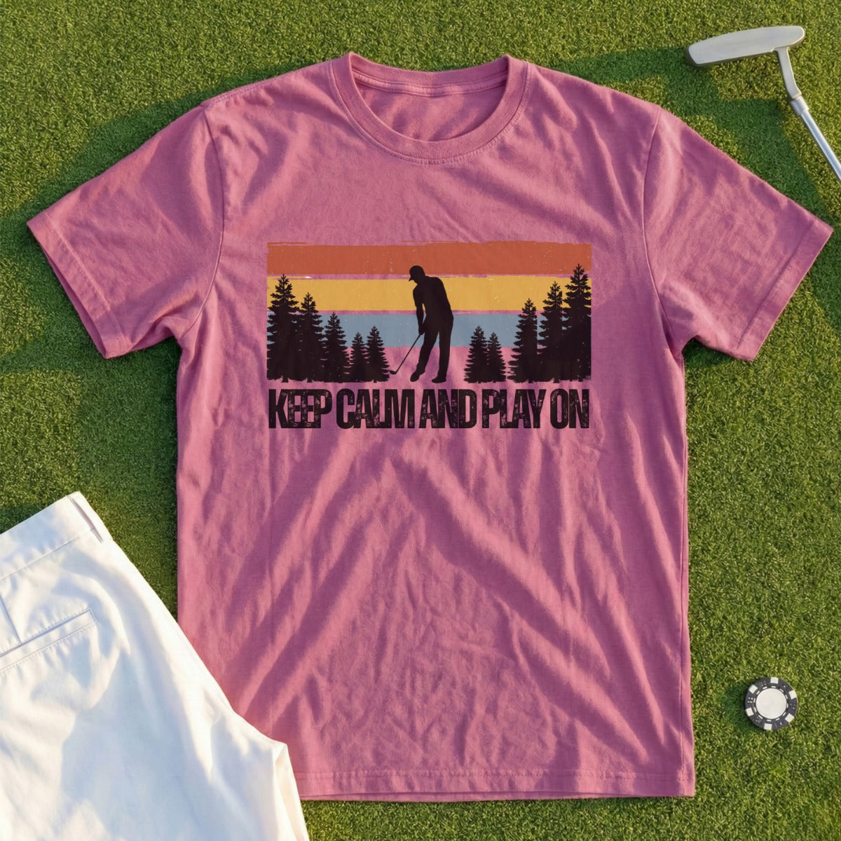 Pink t-shirt with golfer silhouette and "KEEP CALM AND PLAY ON" text.