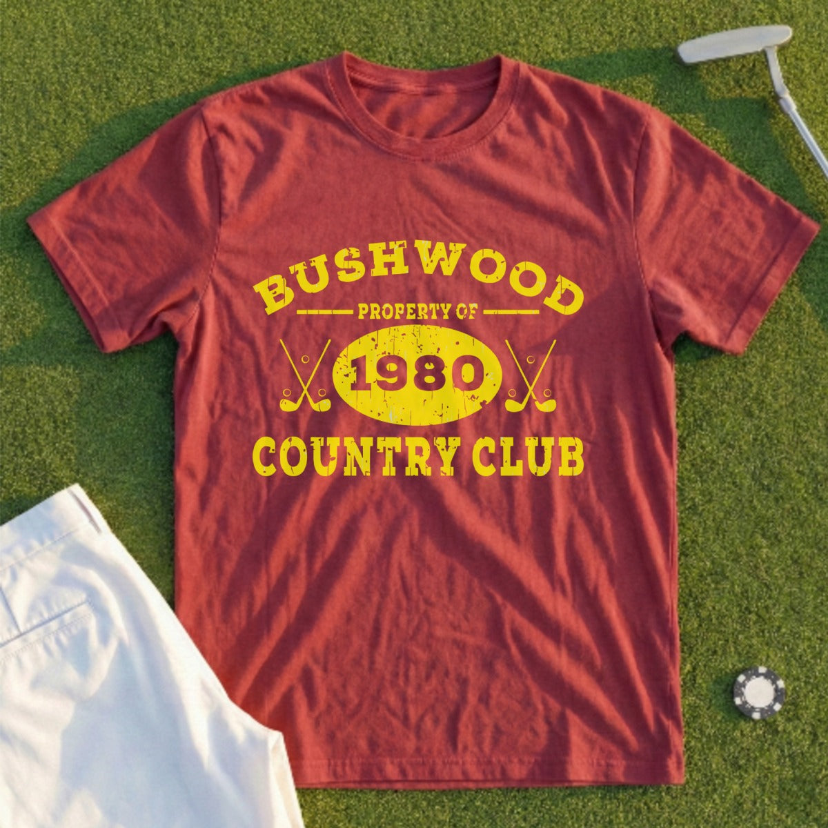 Maroon t-shirt with "Bushwood Country Club 1980" in yellow text and crossed golf clubs.
