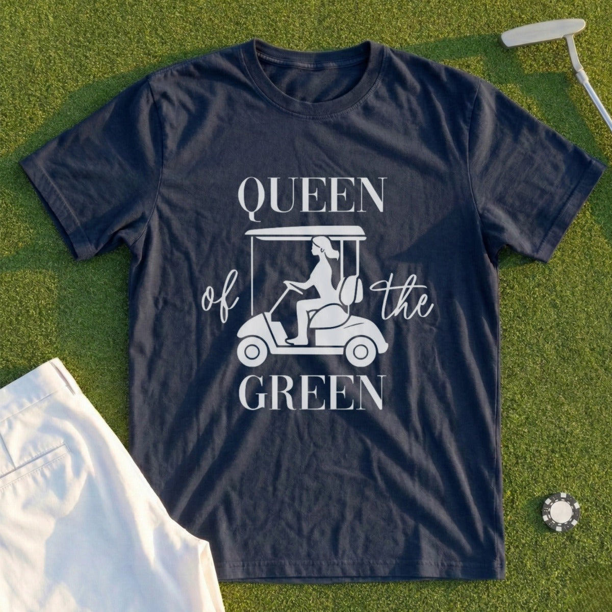 Navy t-shirt with "Queen of the Green" and a golfer in a cart graphic.