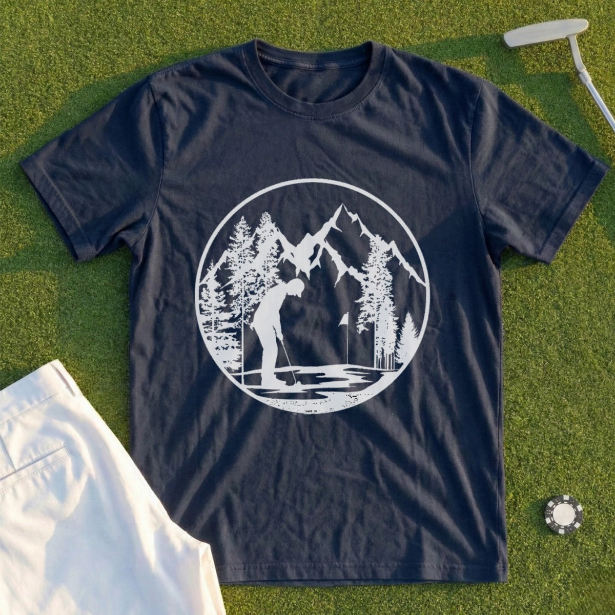 Navy t-shirt with white circular graphic of a golfer at a mountain course.